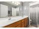 Bathroom boasts double sinks, spacious counters, a large mirror, and updated fixtures providing comfort and functionality at 3784 E Simpson Ct, Gilbert, AZ 85297