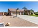 Traditional style home with a three-car garage, desert landscaping, and basketball hoop at 3784 E Simpson Ct, Gilbert, AZ 85297