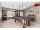 Aesthetic game room with pool table and a window providing natural light at 3784 E Simpson Ct, Gilbert, AZ 85297