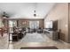 Comfortable living room showcases tile flooring, ceiling fans, and an open layout at 3784 E Simpson Ct, Gilbert, AZ 85297