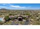 Stunning aerial view of a community clubhouse, pool, and surrounding landscape at 3812 N Barron --, Mesa, AZ 85207