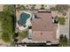 An aerial view of the home shows the layout of the backyard, private pool, spa, and green space at 3812 N Barron --, Mesa, AZ 85207