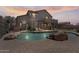 Beautiful backyard featuring a sparkling pool, lush landscaping, and inviting outdoor space at 3812 N Barron --, Mesa, AZ 85207
