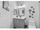 Beautiful bathroom features modern vanity, framed mirror, and decorative wall art at 3812 N Barron --, Mesa, AZ 85207