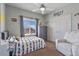 Bedroom features a chair, a window, a full bed and ceiling fan at 3812 N Barron --, Mesa, AZ 85207