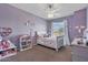 Bedroom featuring a window, a ceiling fan and a bed with toys at 3812 N Barron --, Mesa, AZ 85207