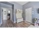 Inviting entryway features stylish hall tree and durable wood-look laminate flooring throughout at 3812 N Barron --, Mesa, AZ 85207