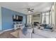 Stylish living room featuring a blue accent wall, modern furnishings, and an inviting atmosphere at 3812 N Barron --, Mesa, AZ 85207