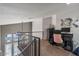 Versatile loft space, ideal for a home office, with a view of the house's entryway and stairs at 3812 N Barron --, Mesa, AZ 85207