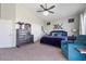 Comfortable and spacious main bedroom features a king-size bed and a cozy sitting area at 3812 N Barron --, Mesa, AZ 85207