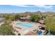 Resort-style pool area featuring a lap pool, hot tub, lounge chairs, and a covered pavilion with desert mountain views at 3812 N Barron --, Mesa, AZ 85207