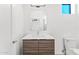 Bright bathroom features a single vanity and modern fixtures, alongside a toilet, offering a clean, functional design at 4220 N 32Nd St # 2, Phoenix, AZ 85018