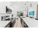 Well-equipped kitchen featuring modern appliances, sleek countertops, and a smooth transition to the living area at 4220 N 32Nd St # 2, Phoenix, AZ 85018