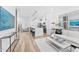 Spacious living area showcasing an open layout, stylish decor, and seamless flow between kitchen and lounge at 4220 N 32Nd St # 2, Phoenix, AZ 85018