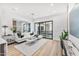 Elegant living room featuring a comfortable white sofa, modern decor, and bright, natural light at 4220 N 32Nd St # 2, Phoenix, AZ 85018