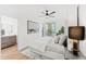 Comfortable main bedroom with modern decor, a ceiling fan, and view of a luxury ensuite at 4220 N 32Nd St # 2, Phoenix, AZ 85018