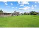 Expansive backyard with lush green grass, ideal for outdoor activities and relaxation at 4502 W Greenway Rd, Glendale, AZ 85306