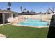 Beautiful backyard with artificial turf and a large, inviting private swimming pool at 4517 S Grandview Ave, Tempe, AZ 85282