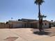 Charming single-story home featuring a lush palm tree and an expansive driveway for ample parking at 4517 S Grandview Ave, Tempe, AZ 85282