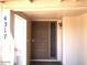 Inviting front entryway with a secure screen door and sidelight window for added natural light at 4517 S Grandview Ave, Tempe, AZ 85282