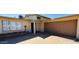 Close up of the exterior of the home including the front door, flower bed, and two car garage at 4517 S Grandview Ave, Tempe, AZ 85282
