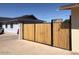 Newly installed wooden gate for added security and backyard privacy at 4517 S Grandview Ave, Tempe, AZ 85282