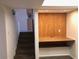A stairway leads to an office nook with a built-in desk, offering a functional workspace at 4517 S Grandview Ave, Tempe, AZ 85282