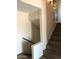 Modern staircase with updated railing and accent lighting at 4517 S Grandview Ave, Tempe, AZ 85282