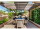 Covered outdoor dining space featuring ample seating, perfect for enjoying meals in a relaxed setting at 5018 E Kathleen Rd, Scottsdale, AZ 85254