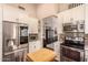 This kitchen offers stainless steel appliances, ample counter space, and modern design at 5018 E Kathleen Rd, Scottsdale, AZ 85254