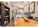Bright, modern kitchen features white cabinets, stainless steel appliances, and a breakfast bar with stylish seating at 5018 E Kathleen Rd, Scottsdale, AZ 85254