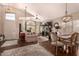 Bright living room with fireplace, modern furnishings, hardwood floors, and ample natural light at 5018 E Kathleen Rd, Scottsdale, AZ 85254