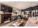 Spacious open-concept living and dining area featuring modern decor and hardwood flooring at 5018 E Kathleen Rd, Scottsdale, AZ 85254