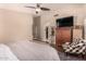 Spacious main bedroom features a sitting area, a large bed, and neutral wall colors at 5018 E Kathleen Rd, Scottsdale, AZ 85254