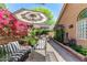 Relaxing patio with pergola, seating, and lush plants for a serene outdoor experience at 5018 E Kathleen Rd, Scottsdale, AZ 85254