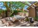 Cozy outdoor seating area with brick accents, offering a private and comfortable space to unwind at 5018 E Kathleen Rd, Scottsdale, AZ 85254
