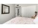 Bedroom with a slider closet, ensuite access, and neutral colors at 556 W Sagebrush St, Gilbert, AZ 85233