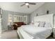 Primary bedroom showcasing vaulted ceilings and shuttered windows at 556 W Sagebrush St, Gilbert, AZ 85233