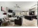 Inviting living room featuring a cozy fireplace and stylish furniture at 556 W Sagebrush St, Gilbert, AZ 85233