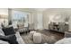 Bright living room showcasing a stylish cabinet, decor, seating, and a white front door at 556 W Sagebrush St, Gilbert, AZ 85233