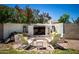 Inviting outdoor fireplace with comfortable seating, perfect for cozy evenings and gatherings at 556 W Sagebrush St, Gilbert, AZ 85233
