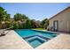 Sparkling pool and spa surrounded by lush landscaping, creating a private outdoor oasis at 556 W Sagebrush St, Gilbert, AZ 85233