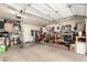 Spacious two-car garage offering ample storage and workbench space at 630 E Jensen St # 116, Mesa, AZ 85203