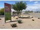 Park of the Canals entrance with desert landscaping and informative park signage at 630 E Jensen St # 116, Mesa, AZ 85203