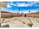 Spacious backyard with a concrete patio and block fence at 6312 N 41St Ave, Phoenix, AZ 85019
