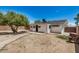 Open backyard with brick home and concrete patio at 6312 N 41St Ave, Phoenix, AZ 85019