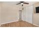Cozy bedroom with laminate flooring, ceiling fan, and ample closet space at 6312 N 41St Ave, Phoenix, AZ 85019