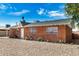 Quaint brick home showcasing a tidy, low-maintenance front yard and symmetrical window placement at 6312 N 41St Ave, Phoenix, AZ 85019