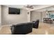 Inviting living room featuring neutral paint, ceiling fans, tile flooring, and comfortable seating in a seamless layout at 6312 N 41St Ave, Phoenix, AZ 85019