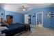 Primary bedroom with vaulted ceiling and ensuite bathroom access showcases a cozy retreat at 6462 E Raftriver St, Mesa, AZ 85215